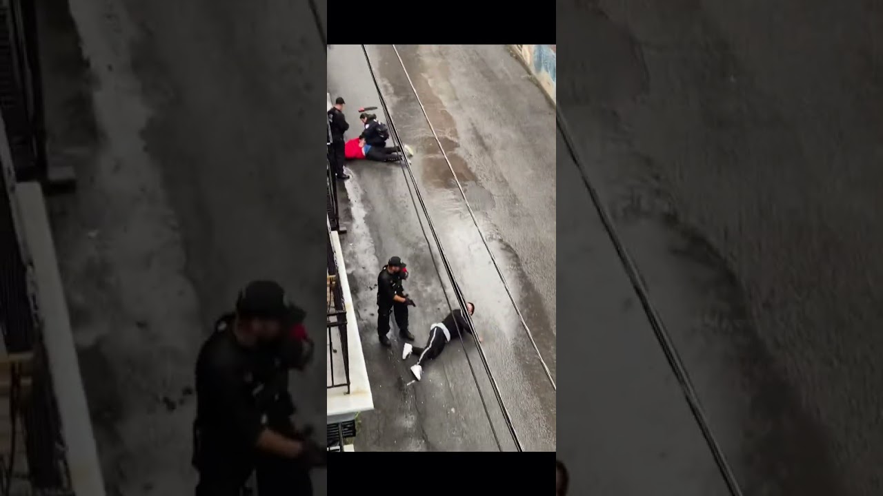 The moment two gang members are arrested in a Montreal back alley, ordered on the ground!
