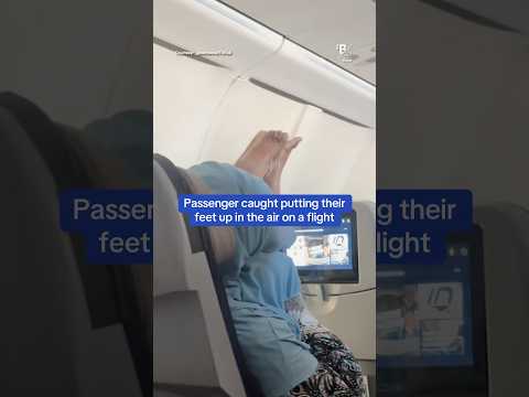 Passenger caught putting their feet up in the air on a flight